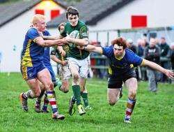 Marc Anderson breaks clear of Aberdeen’s Ross Barber and Aiden Holland to set up an attack at Millbank on Saturday.