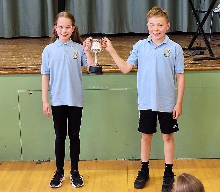 Cara and Ian hold a school trophy for the highest scores in the school across the whole festival week. Cara achieved it for her scores playing the violin and Ian for verse speaking. Pictures: Scott Sinclair