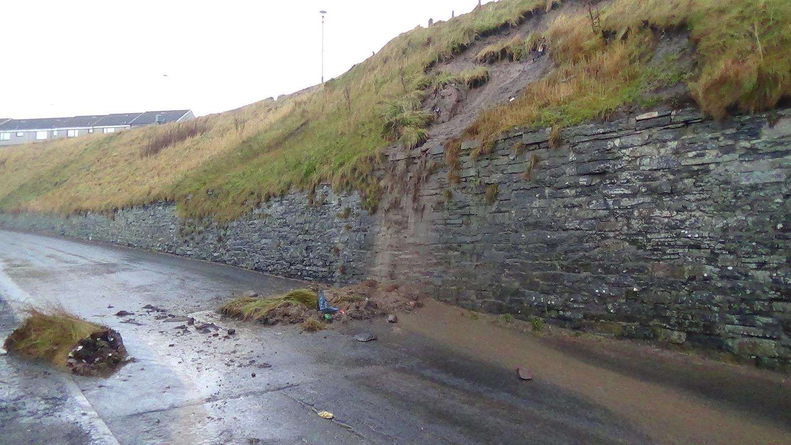 Harbour Road in Wick was closed off after a section of cliff collapsed. Photo: Will Clark