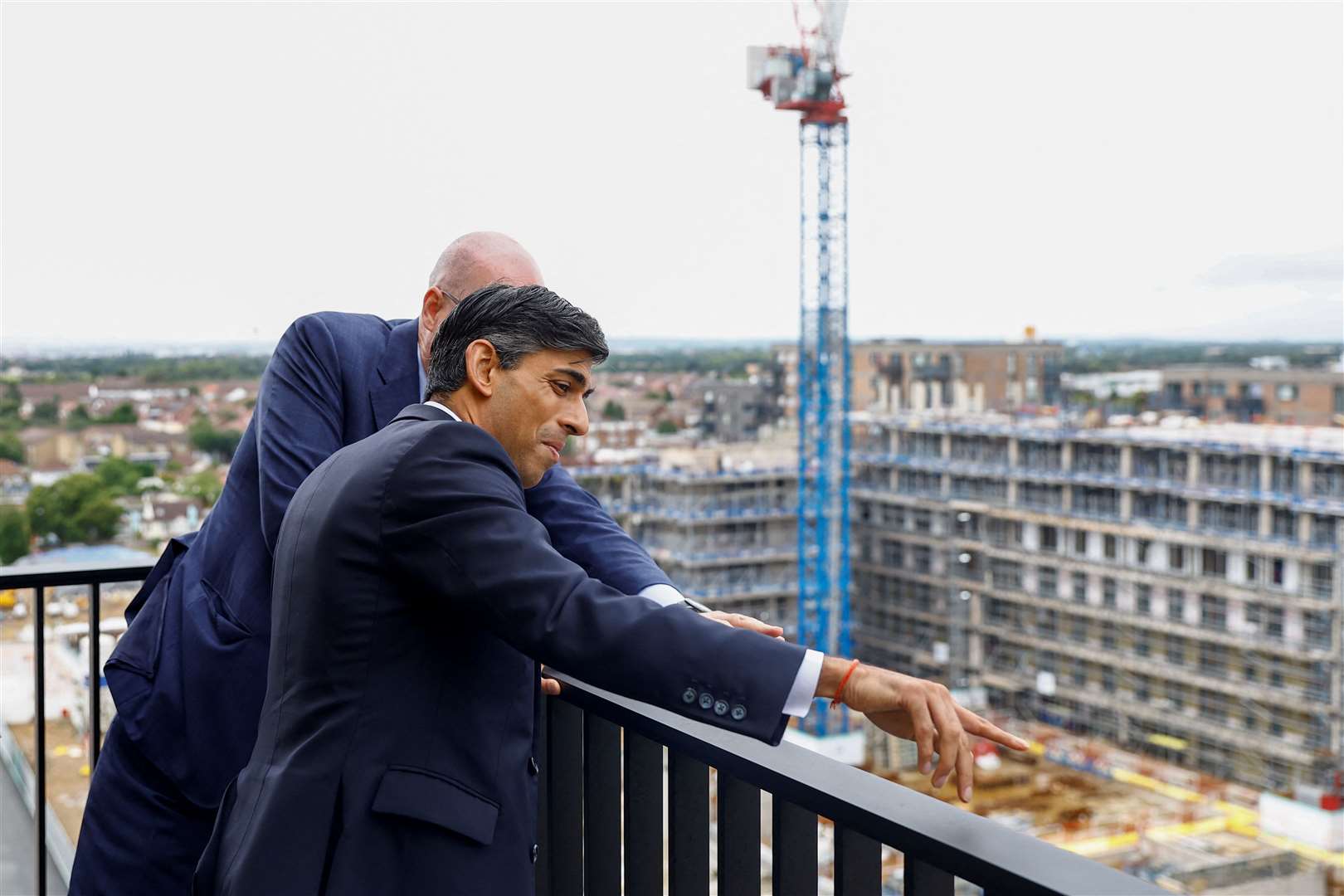 Prime Minister Rishi Sunak at Hayes Village, a new housing development under construction by Barratt Homes in west London (Pete Cziborra/PA)