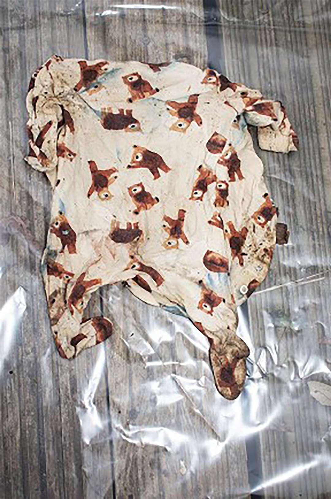 A babygrow found in a Lidl bag in a shed in Lower Roedale Allotments (Met Police/PA)