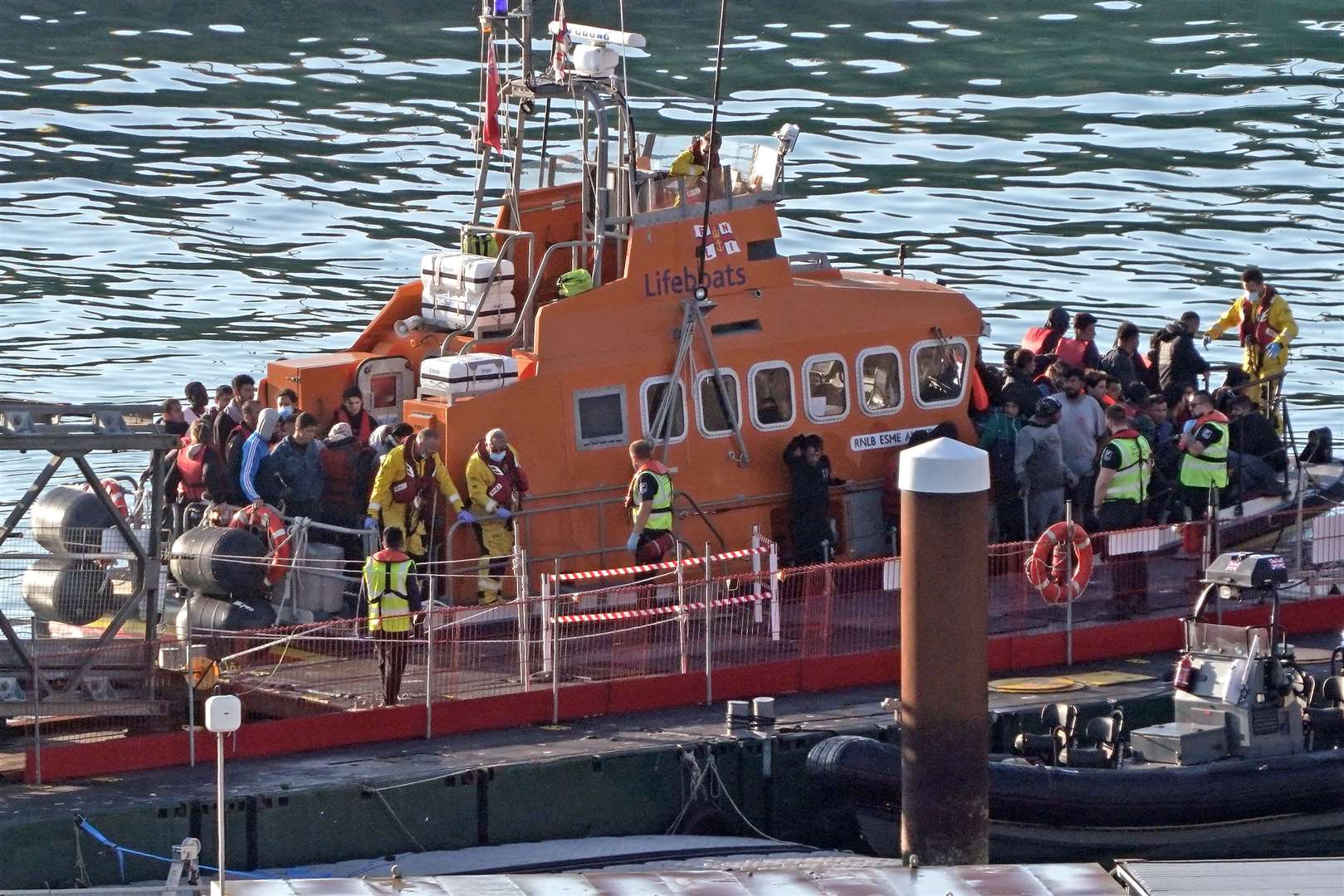 A group of people thought to be migrants are brought in to Dover, Kent, onboard the Ramsgate Lifeboat on Thursday (Gareth Fuller/PA)