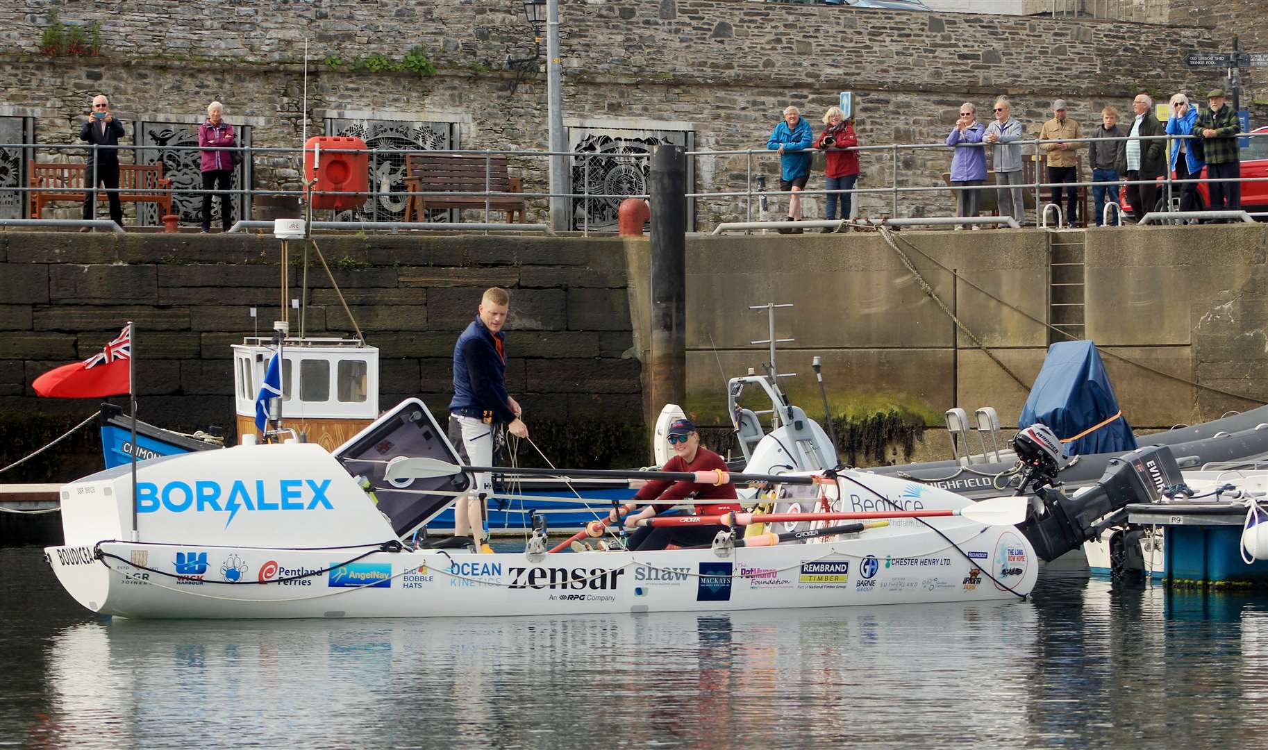 Allan Lipp and Mhairi Ross leaving the Wick marina. Picture: Alan Hendry