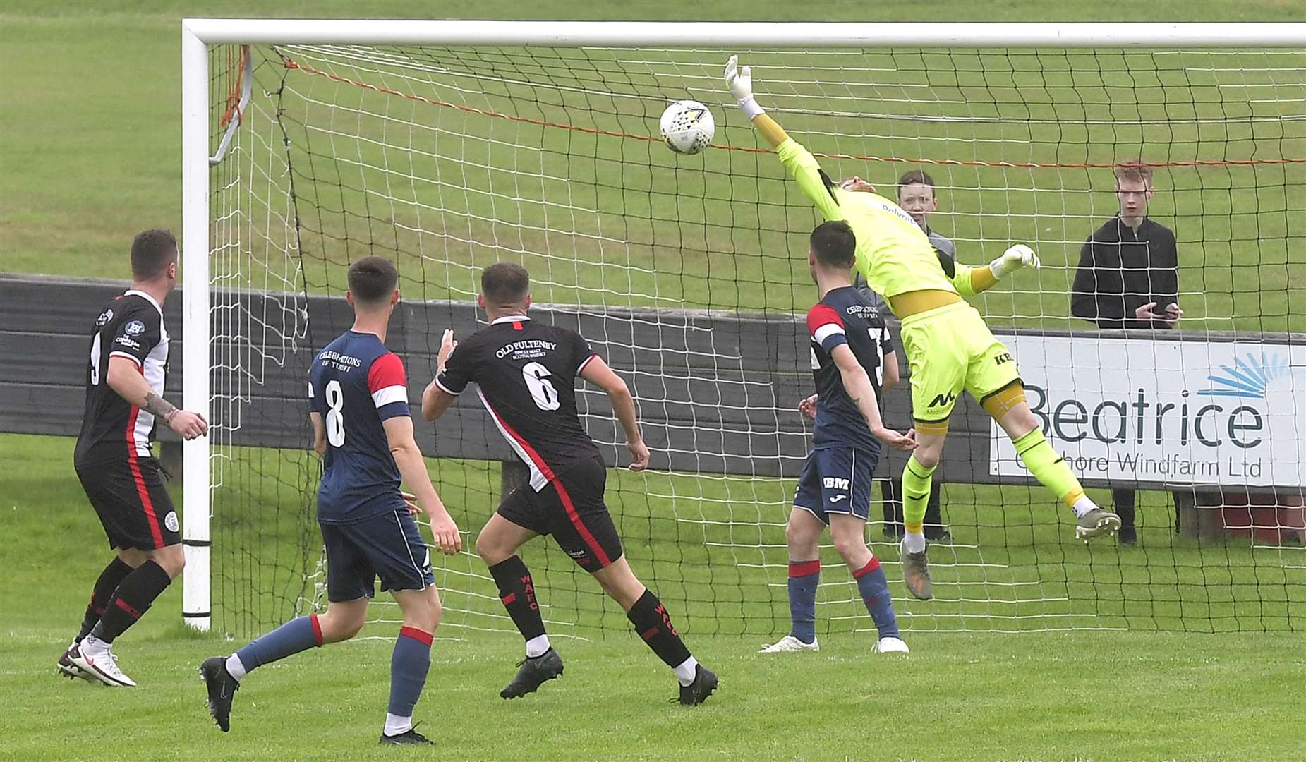 Wick Academy's Jack Henry (number 6) watches as his header flies past the outstretched arm of Turriff United goalie David Dey. Picture: Mel Roger