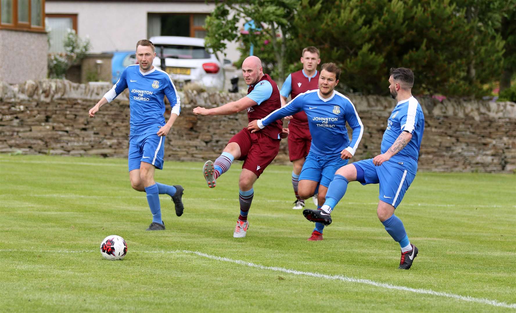 Pentland United striker Colin Maclean fires in the opener despite the attentions of three defenders. Picture: James Gunn