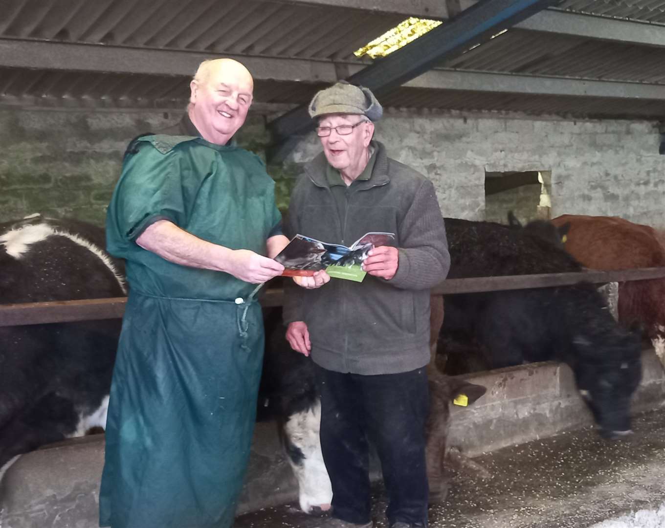 Willie Mackay (left) discussing this year's cattle insemination programme with James (Jimmag) Black at Smerral.