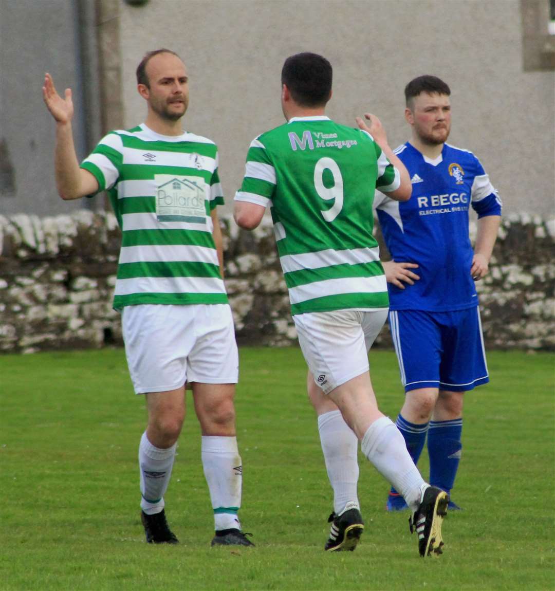 Benn Murray (left) congratulates Michael Smith after one of his three goals for Castletown.