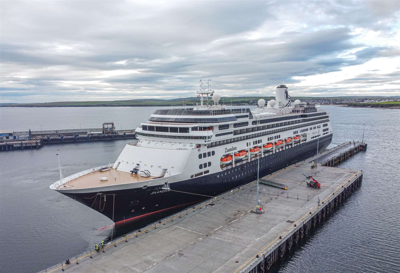 The Zaandam moored alongside the 250-metre east berth of the recently redeveloped St Ola Pier. Picture: Barry Scollay / Highland Aerial Views