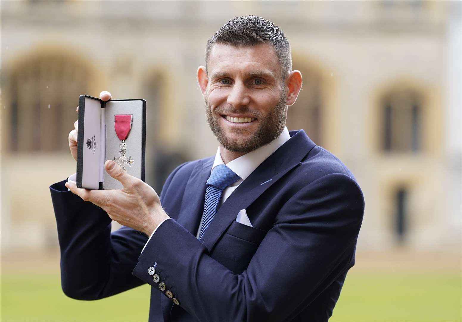 James Milner with his MBE medal (Andrew Matthews/PA)