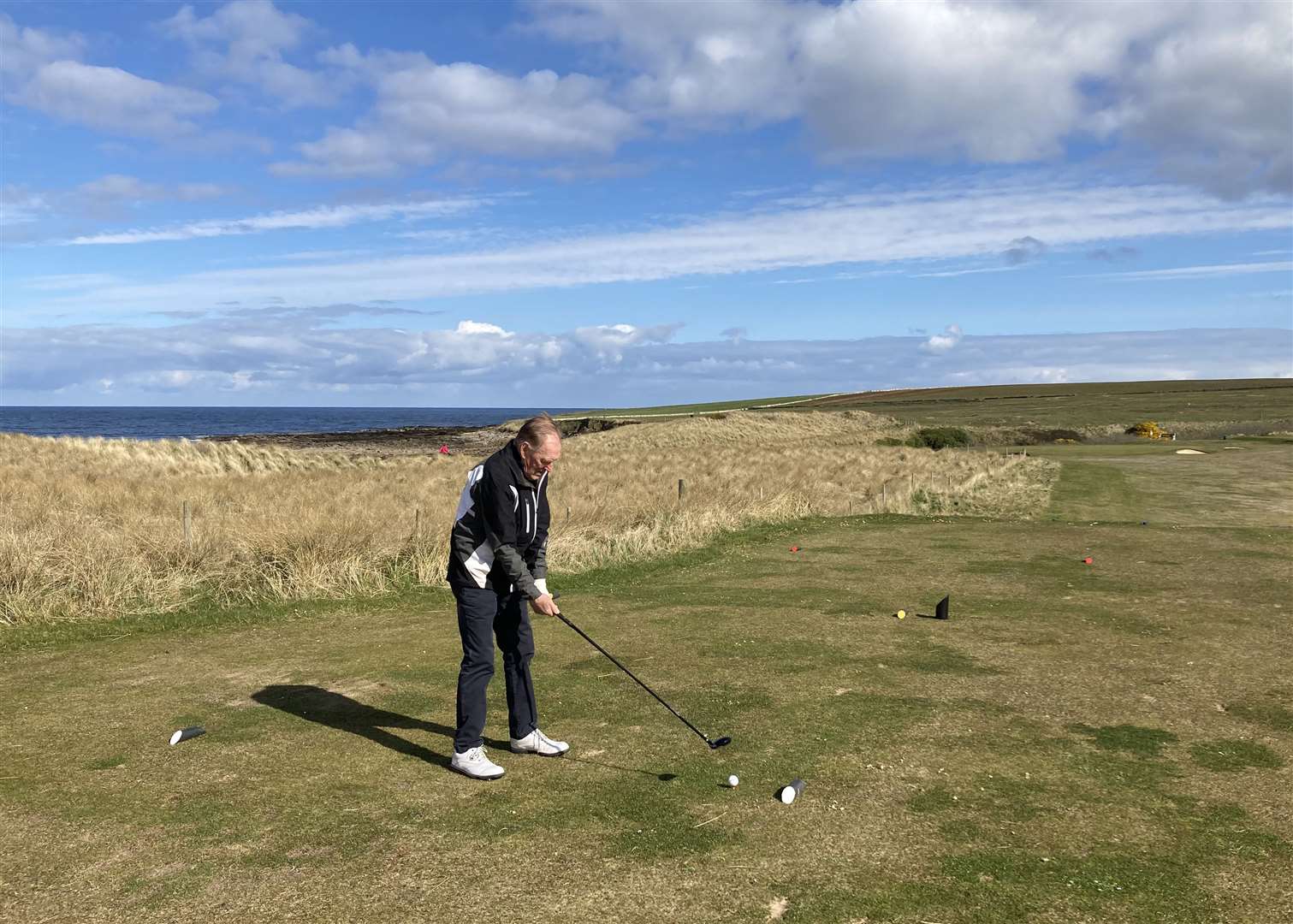 Murdo Macdonald, winner of this week's round of the North Point Distillery Senior Stableford competition, teeing off at the ninth hole.