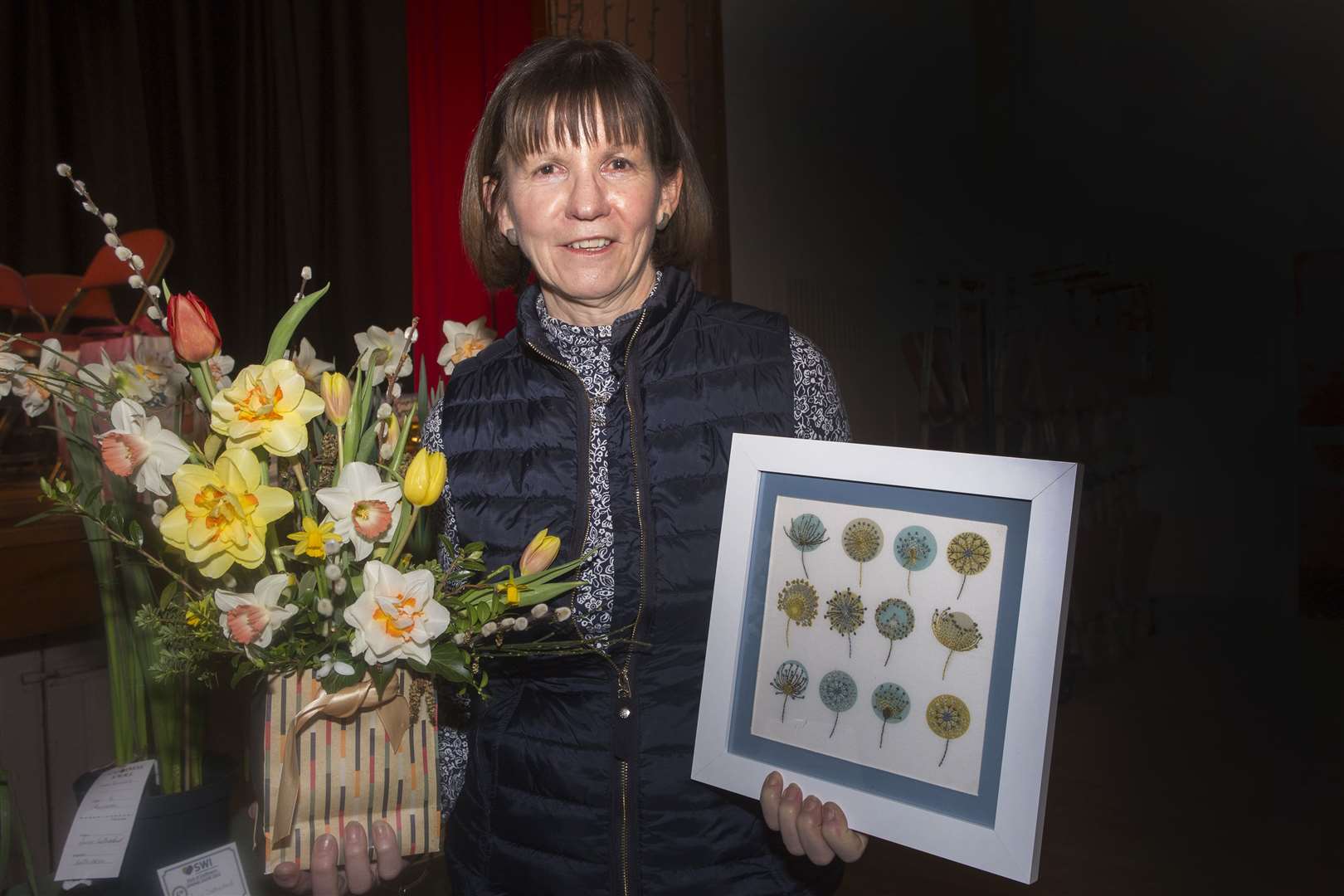 Carol Grant, Latheron, won the trophy for most points overall at the East of Caithness SWI bulb show. She is seen here displaying two of her exhibits. Picture: Robert MacDonald/Northern Studios