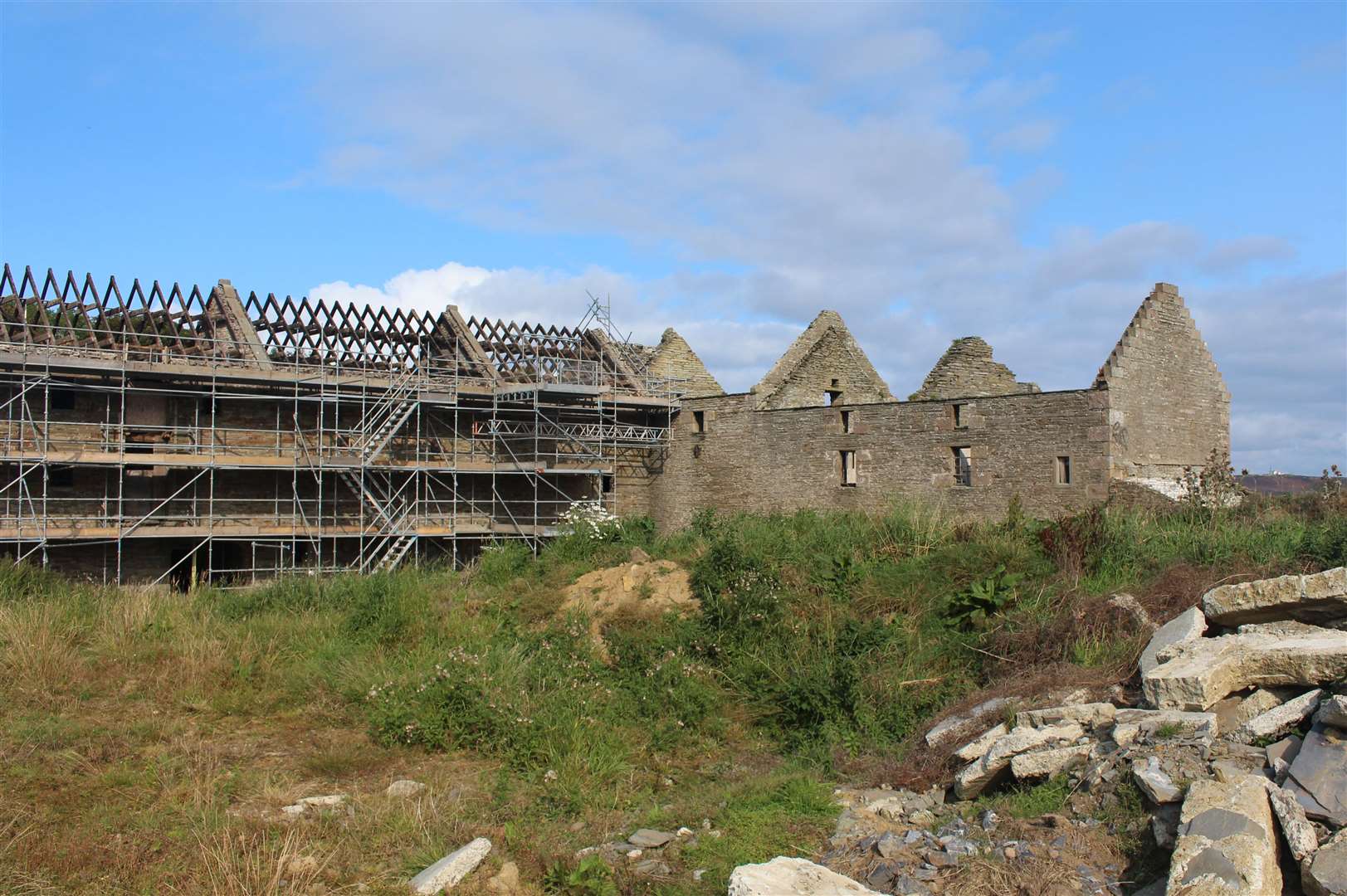 Castletown mill before work on the roof had begun, with the missing roof on the 1818 building and the scaffolding surround the 1888 extension. Picture: John Davidson