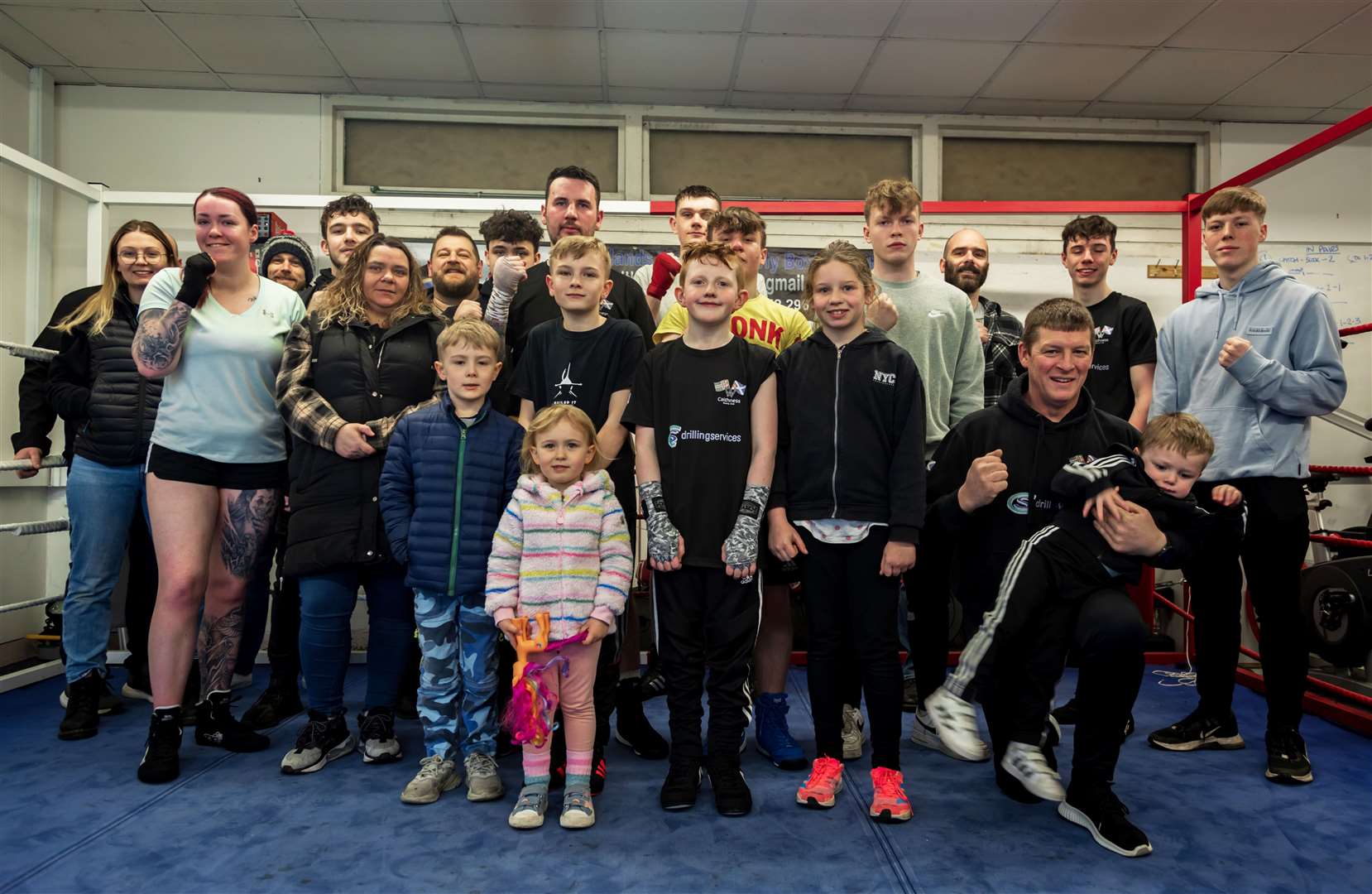 Founder Liall Mackenzie (centre, left) with Caithness Boxing Club members at the presentation on Saturday. Picture: Ally Mack Photography