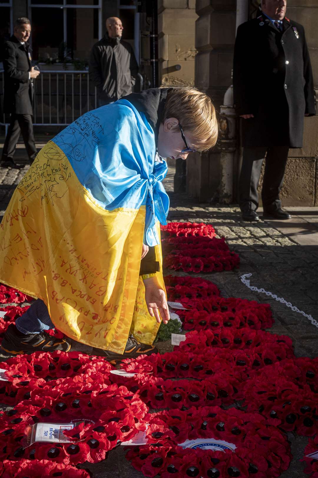 Nine-year-old Sviatoslav laid a wreath to commemorate those who lost a parent in the war in Ukraine (Legion Scotland/PA)
