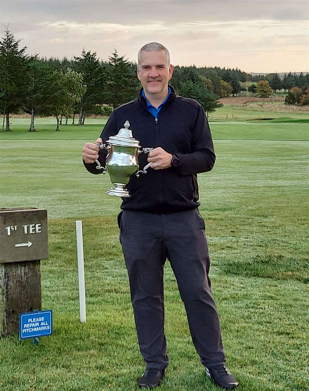 Steven Osborne with the McVitie and Price Trophy at Thurso Golf Club.