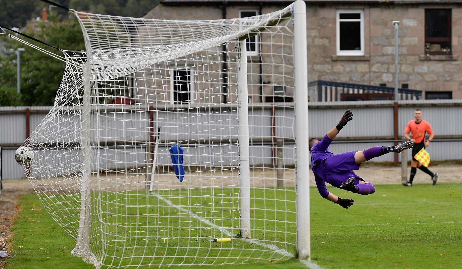 Kyle Henderson's shot flies past Huntly keeper Calum Brodie to bring Wick Academy level at 2-2. Picture: Mel Roger