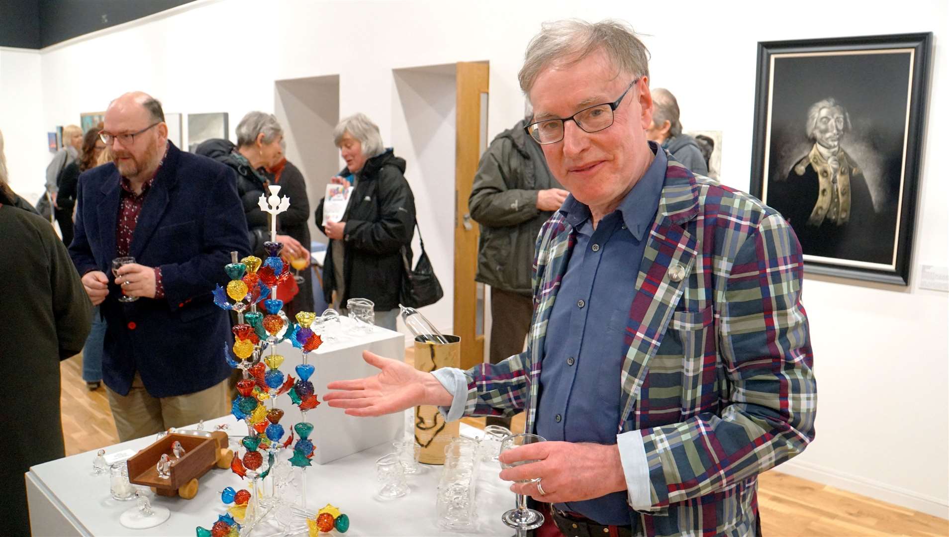 Ian Pearson pictured with some of his glass art at an exhibition in Thurso three years ago. Picture: DGS