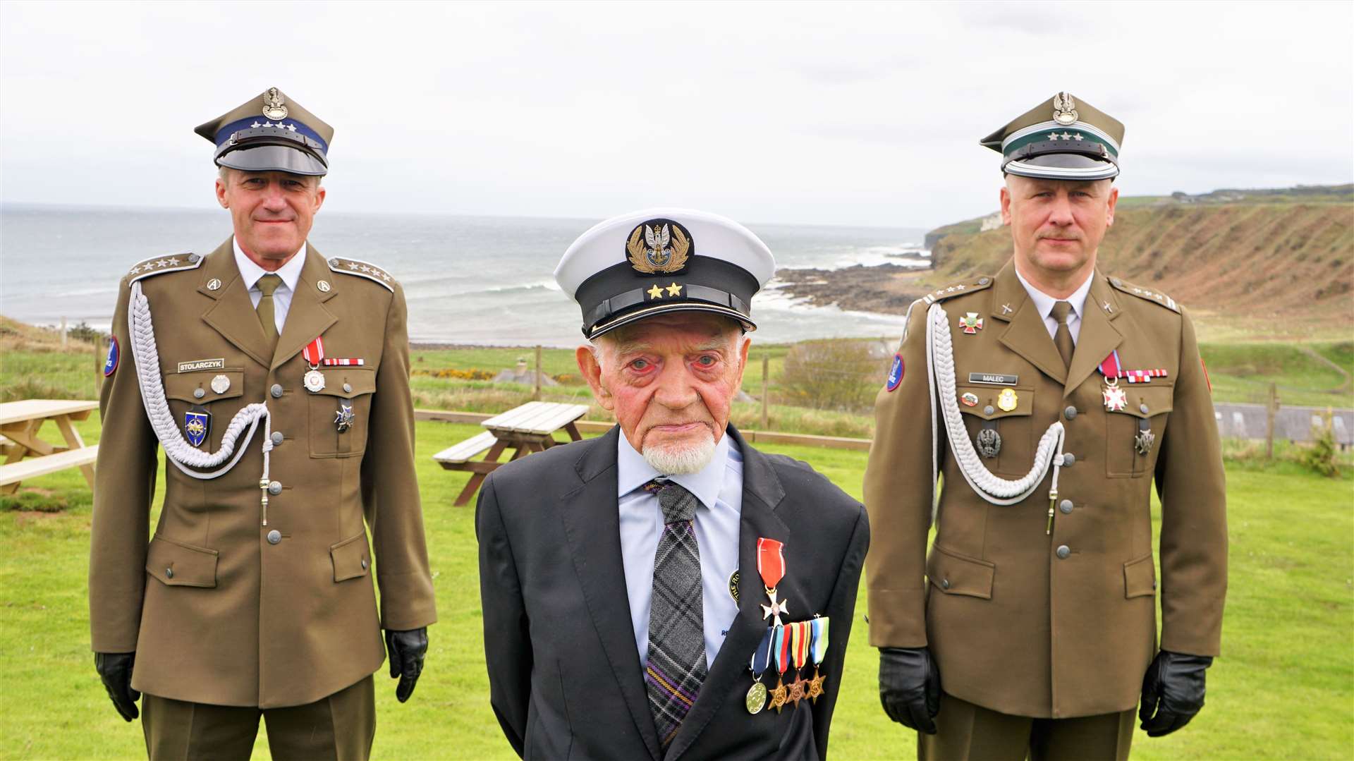 In 2021, Richard Polanski was awarded a special promotion from the Polish President Andrzej Duda, given on his behalf by the embassy staff. From left, Polish defence attaché Colonel Mieczysław Malec, Richard Polanski wearing his honorary naval hat, and Polish warrant officer Krzysztof Stolarczyk. Picture: DGS