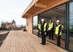 Pictured at the new development at John O’Groats on Monday are (from left): Anthony Wild, of Natural Retreats, tourism minister Fergus Ewing, Rob Gibson MSP and Ian McKee, of GLM architects, which has been working on the project. Photo: Mike Roper