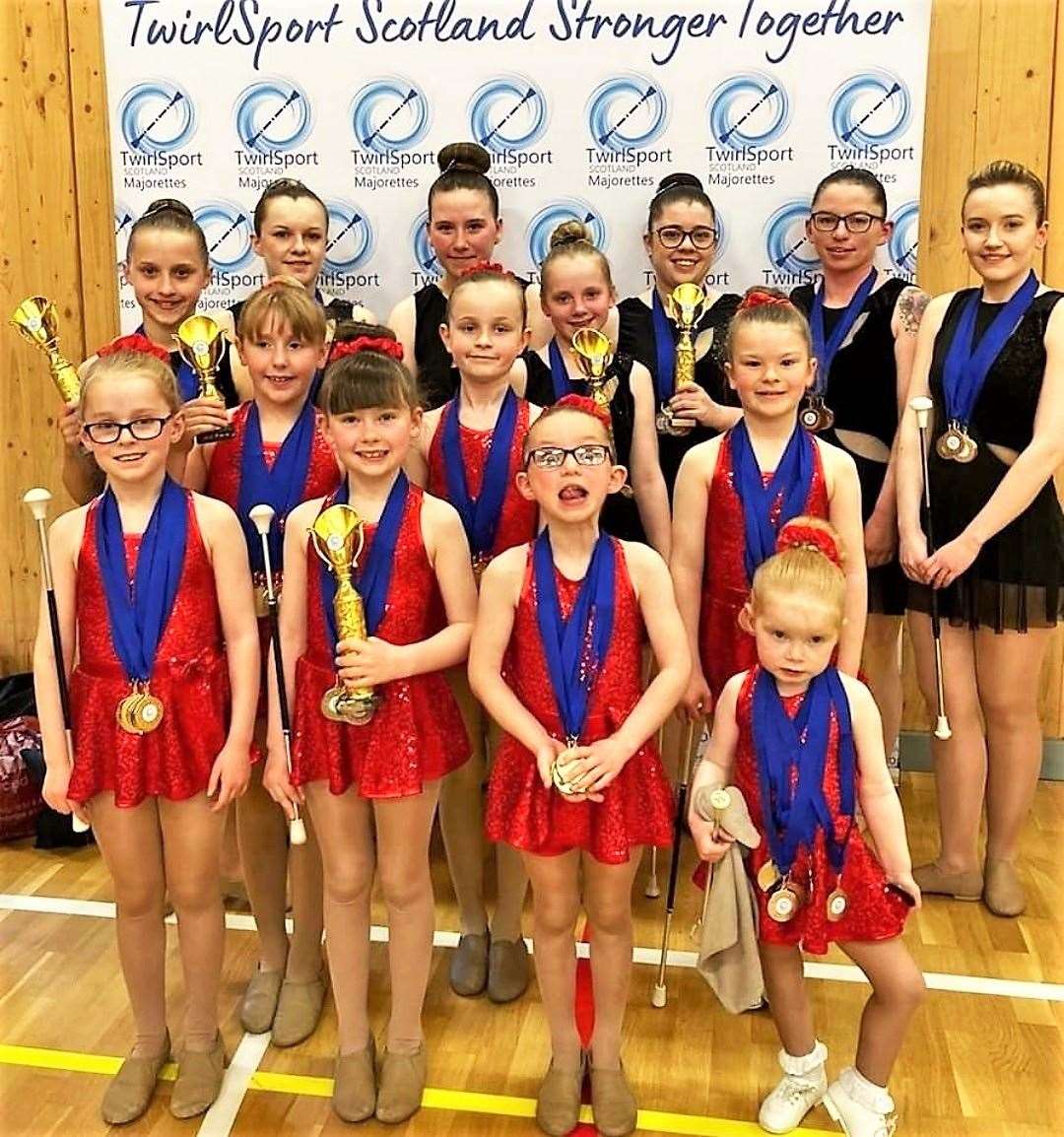 The girls pictured at the end of the competition with their awards.