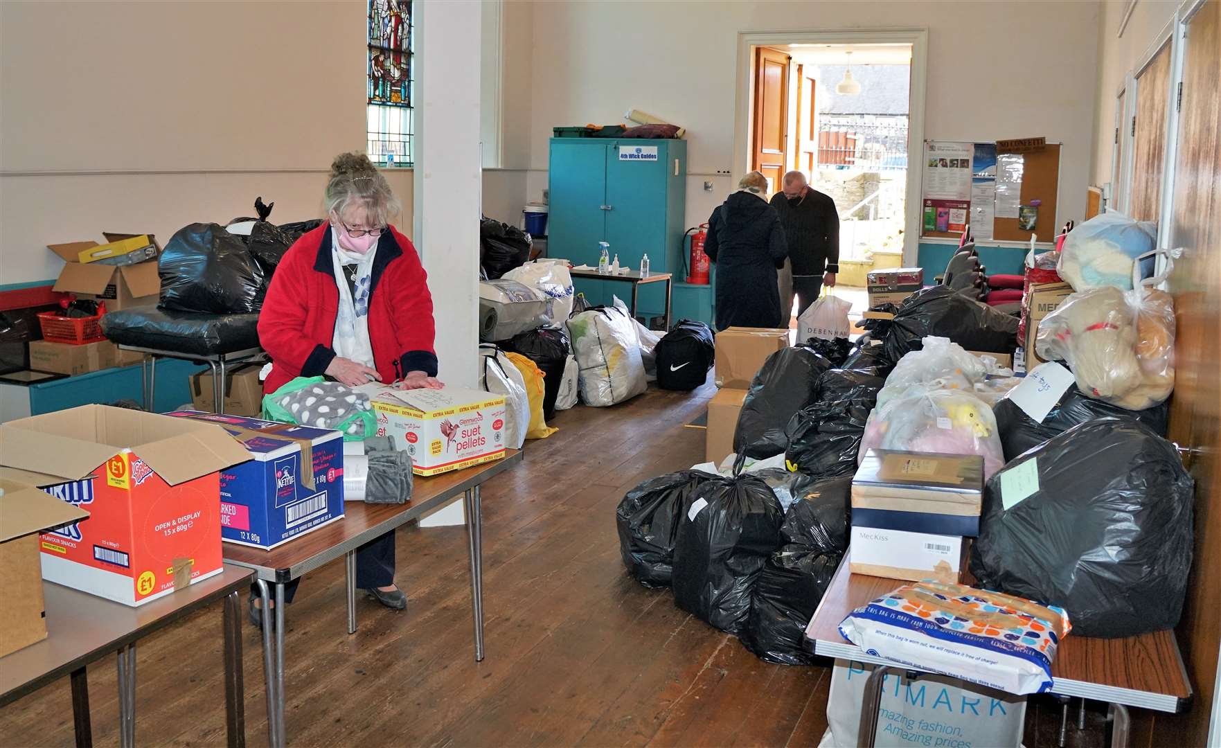 Ukraine appeal at Wick's St Fergus Church on Saturday morning with volunteers collecting the many donations. Picture: DGS