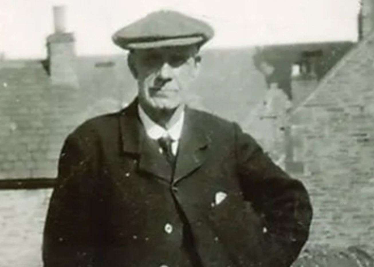 Marwood Sutherland standing in Olrig Street around 1930.
