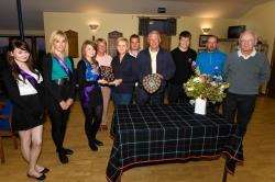 Hannah Mclean (left of centre), winner of the ladies’ handicap trophy at Wick Golf Club’s annual gala week competition, receives her prize from Gala Queen Catherine-Anne Crawford. The ladies’ scratch award went to Marion Mackay, while the men’s handicap w
