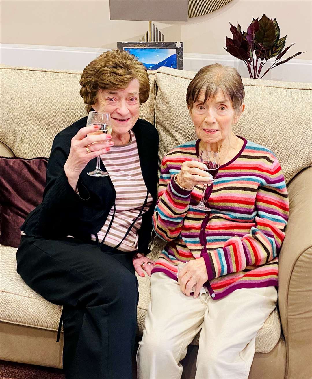 Seaview residents Jennifer and Marna enjoy a glass of wine.