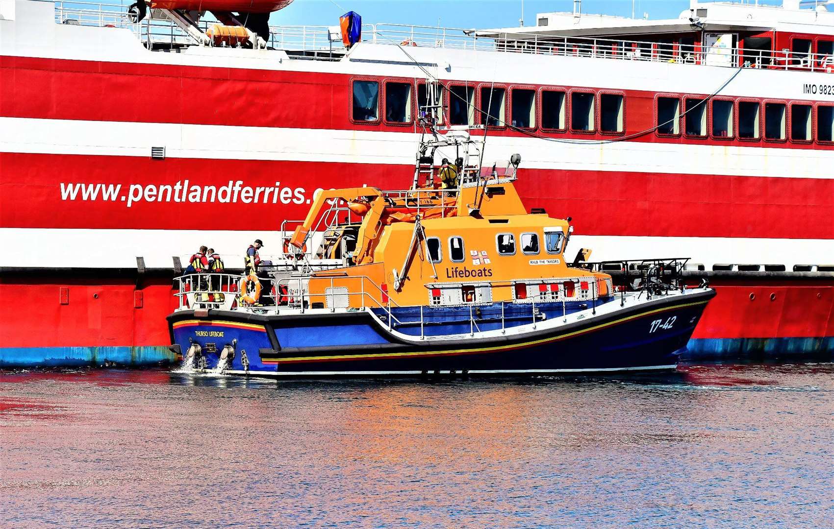 Four casualty care trained RNLI crew members from Thurso lifeboat boarded the Alfred in St Margaret's Hope. Picture: Bruce Flett