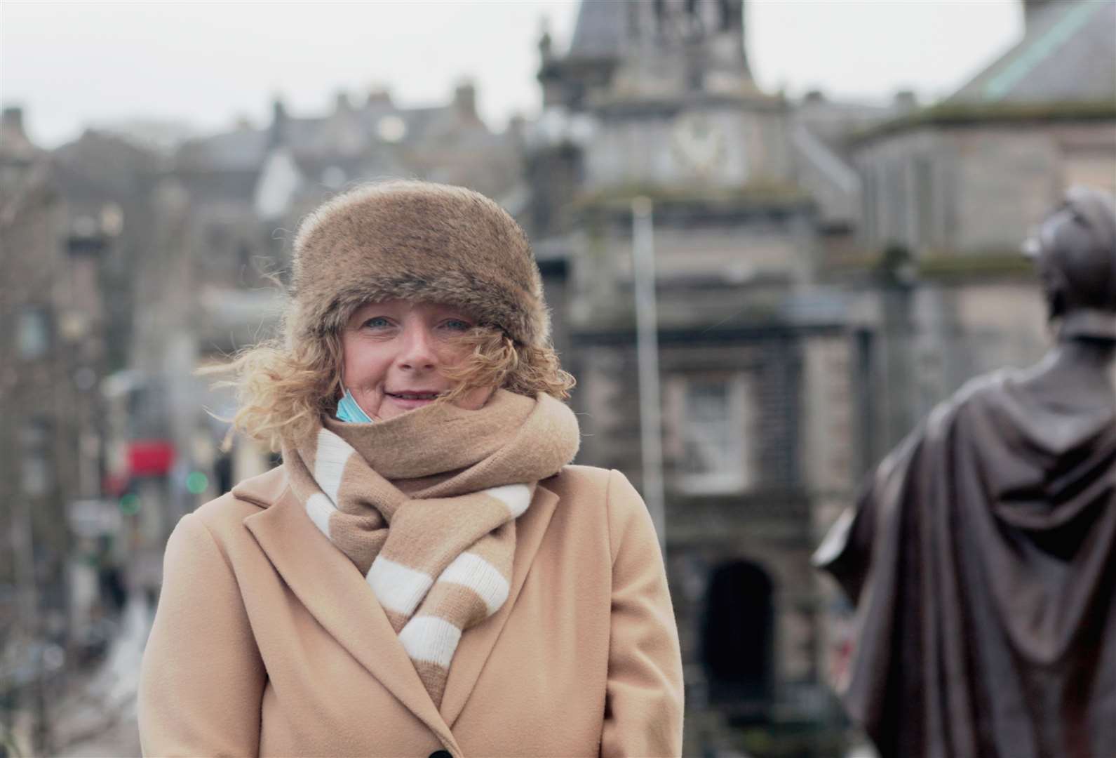 Joanna Coghill, chairperson of the Royal Burgh of Wick Community Council, with Bridge Street in the background.