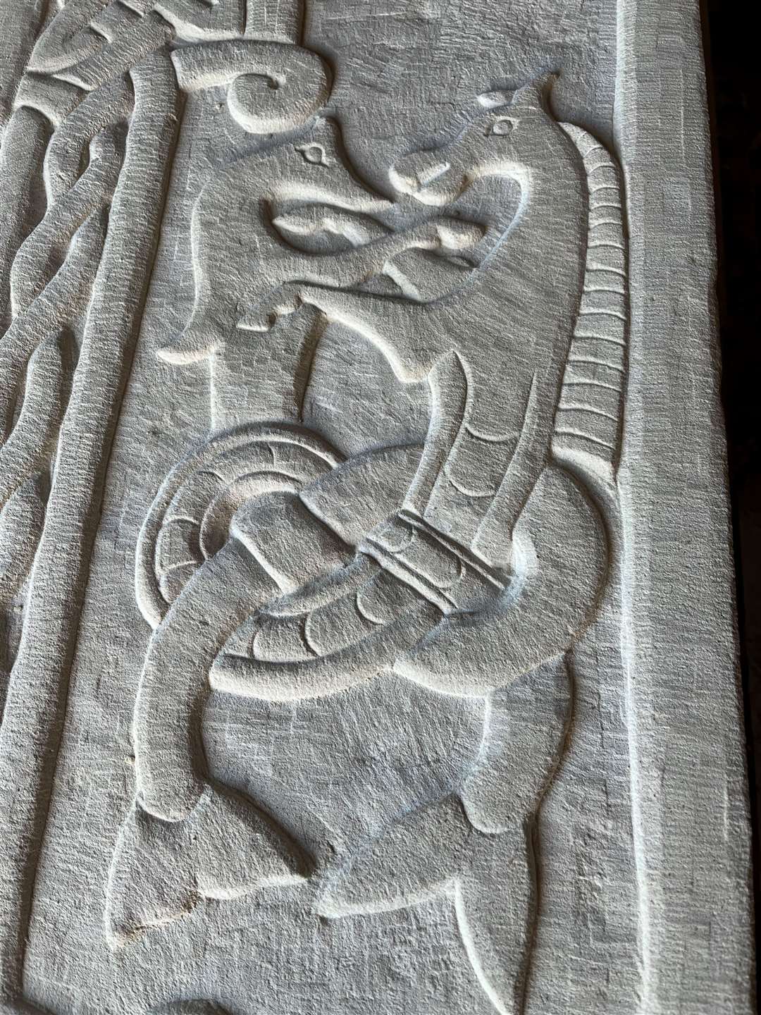 A close-up of the long-lost hippocamps on the stone.
