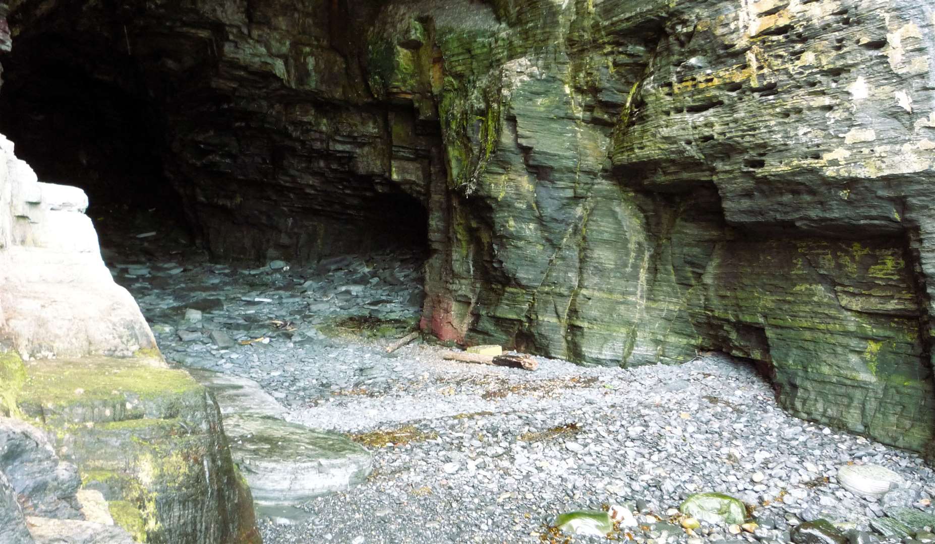 The South Cove in Wick Bay was inhabited for many years. In 1893 a man called William MacFee aged 52, fell 50ft to his death from the top. Some local people have suggested he was murdered and his ghost still haunts the area. Picture: DGS