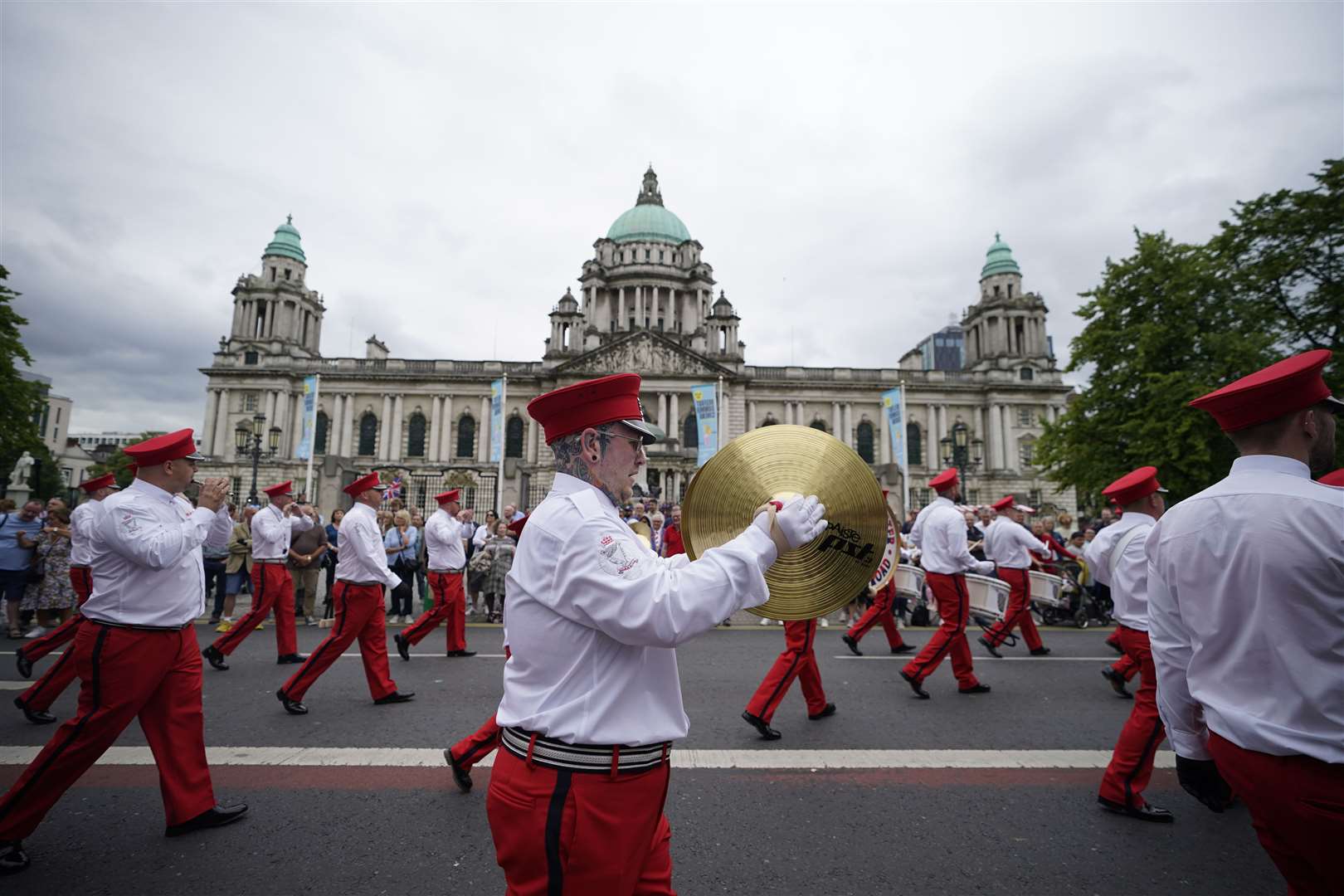 Members of a Protestant loyalist order take part in a Twelfth of July parade in Belfast. (Liam McBurney/PA)