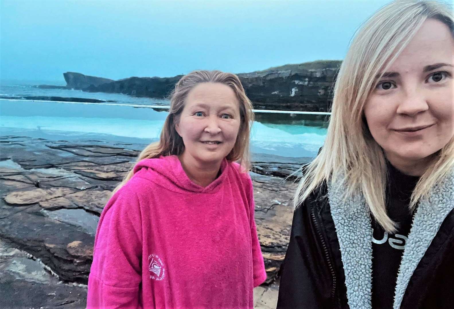 Davina Lyall (left) and Melissa Green braved the elements to swim at the Trinkie outdoor pool at Wick to witness the solstice sunrise. They were the first brave souls to arrive at around 4am on Wednesday.