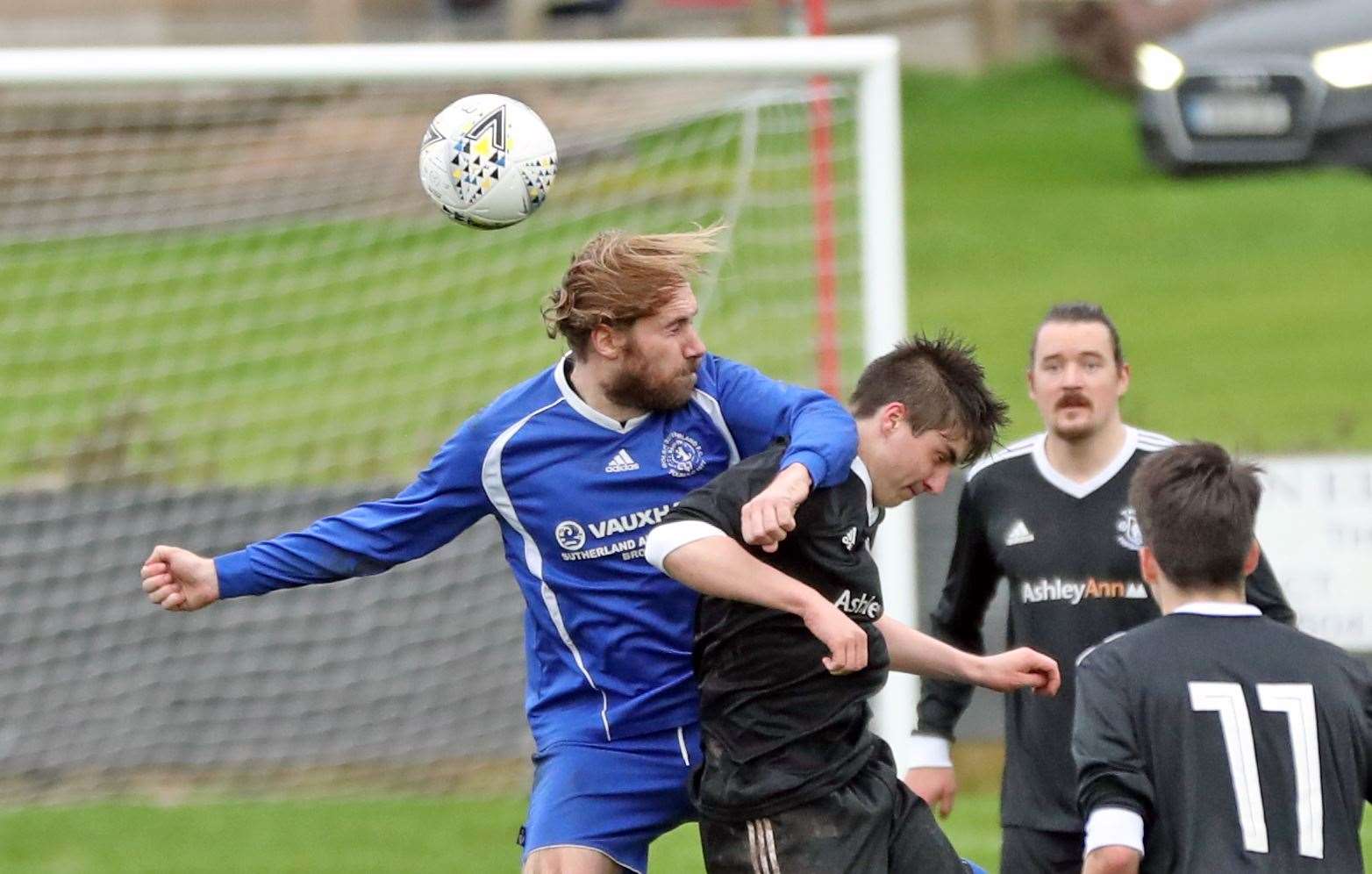 Grant Budge of Golspie Sutherland in an aerial duel with Thurso's Scott MacDonald during last weekend's North Caledonian League opener at the Dammies. Picture: James Gunn