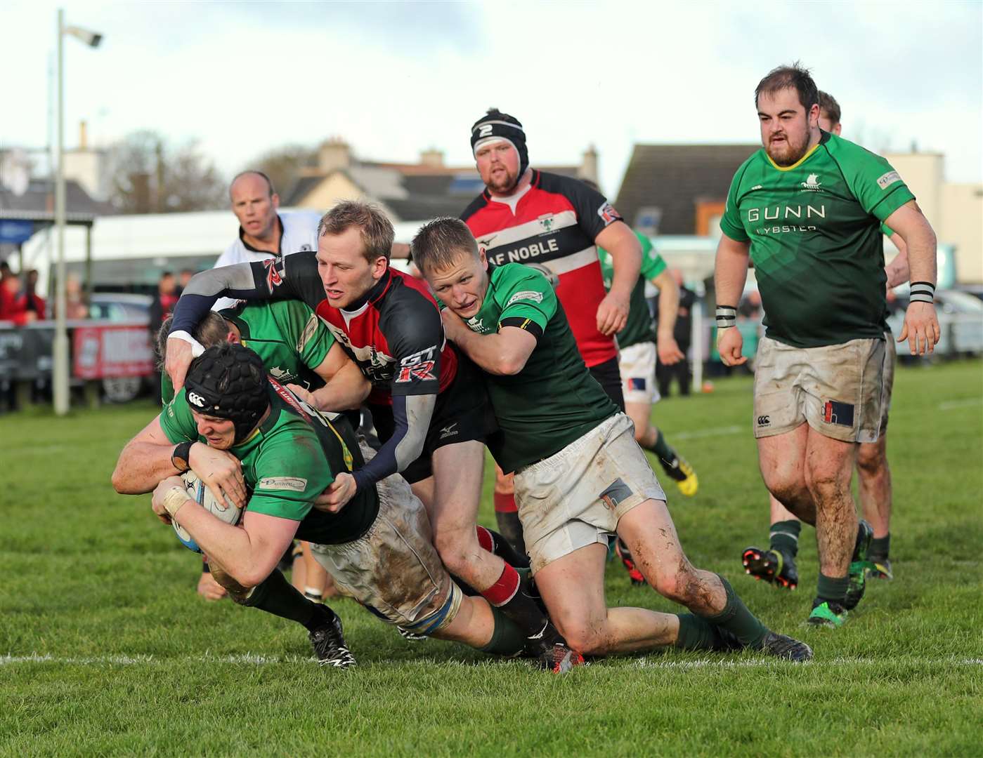 Kevin Budge goes over the line to score a try for the Greens against Lasswade.