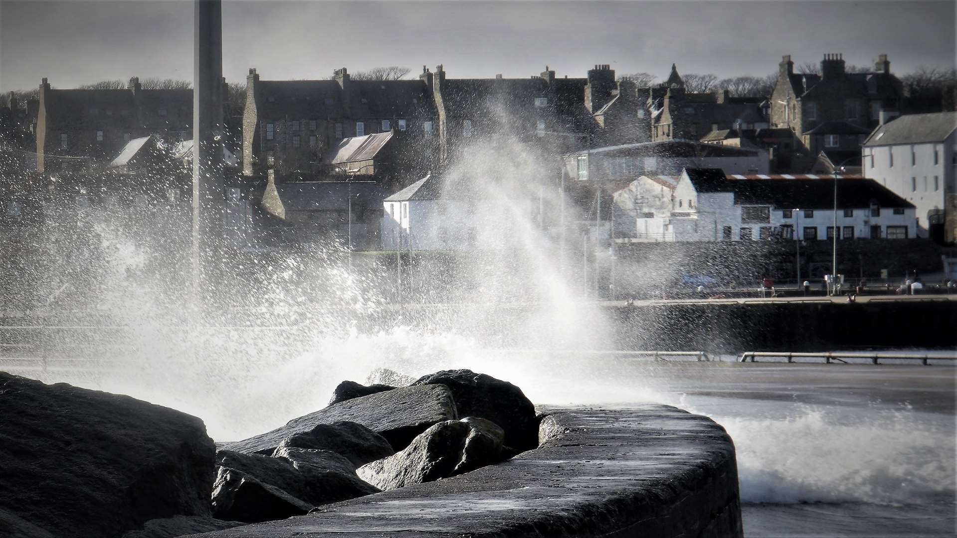 Storm Dennis kicks up a storm around Wick harbour at the weekend and a blurry figure seems apparent at the centre of the photograph. Picture: DGS