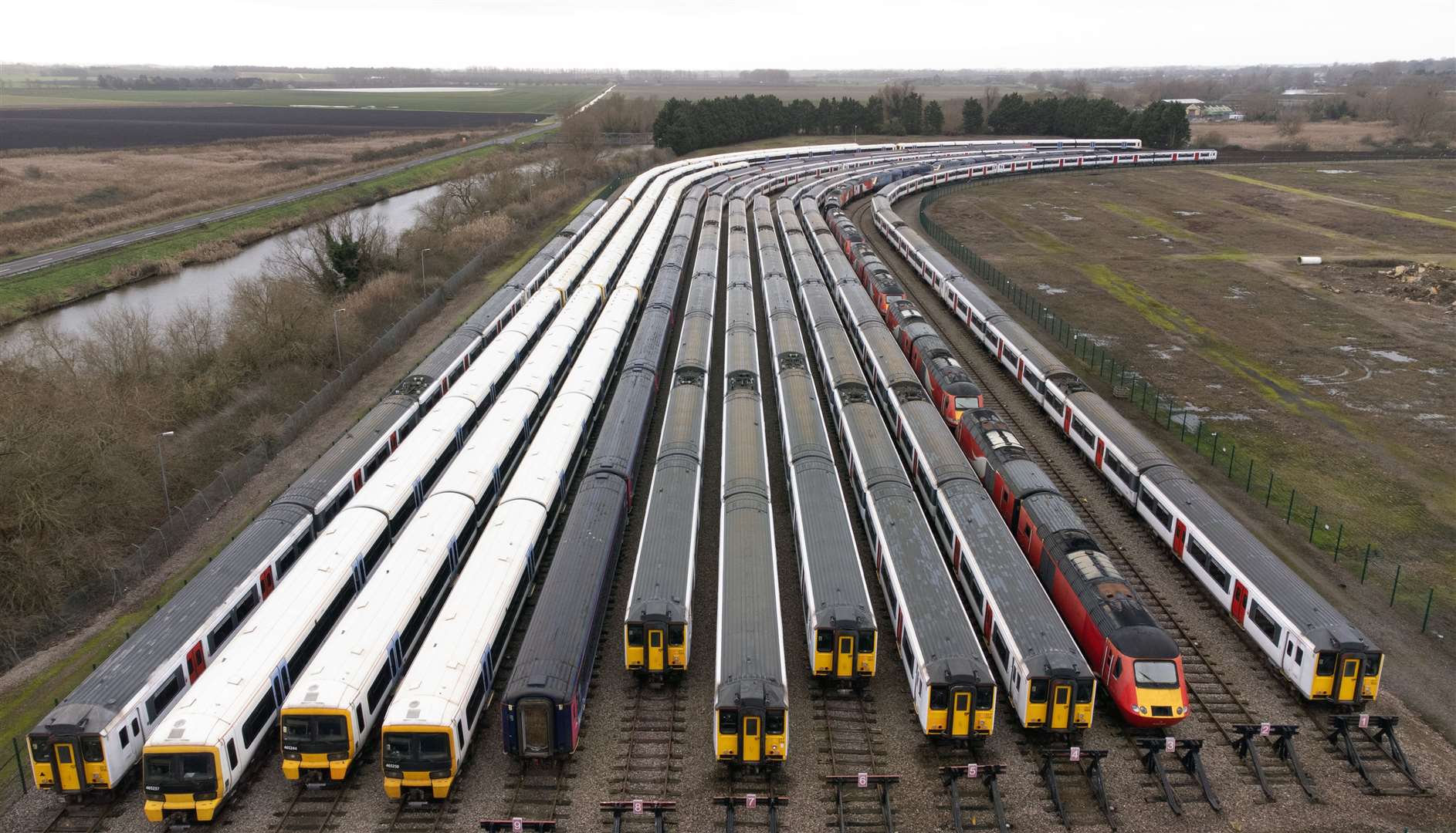 Trains stored at a sidings in Cambridgeshire as train drivers take industrial action (Joe Giddens/PA)