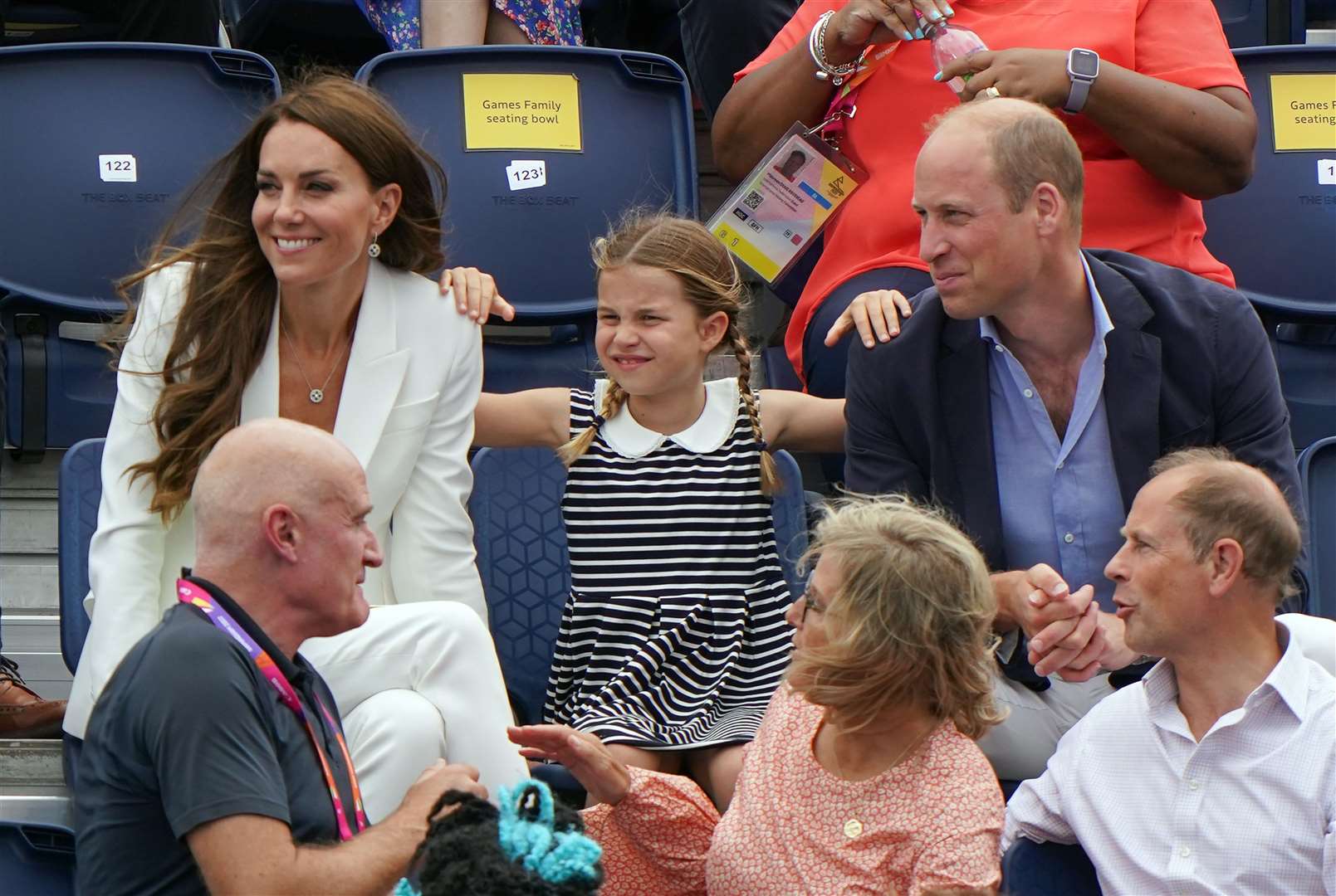 Kate and William with Princess Charlotte seated behind the Earl and Countess of Wessex at the University of Birmingham Hockey and Squash Centre on day five of the 2022 Commonwealth Games in Birmingham (Joe Gidden/PA)