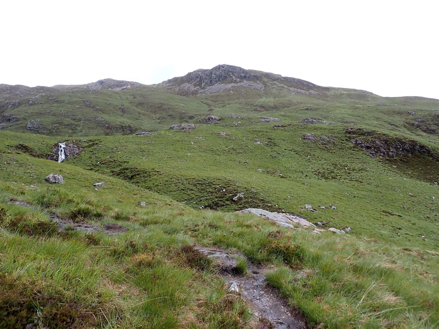 Looking up to the crags below the summit of Sgurr Mhic Bharraich from the stalkers’ path.