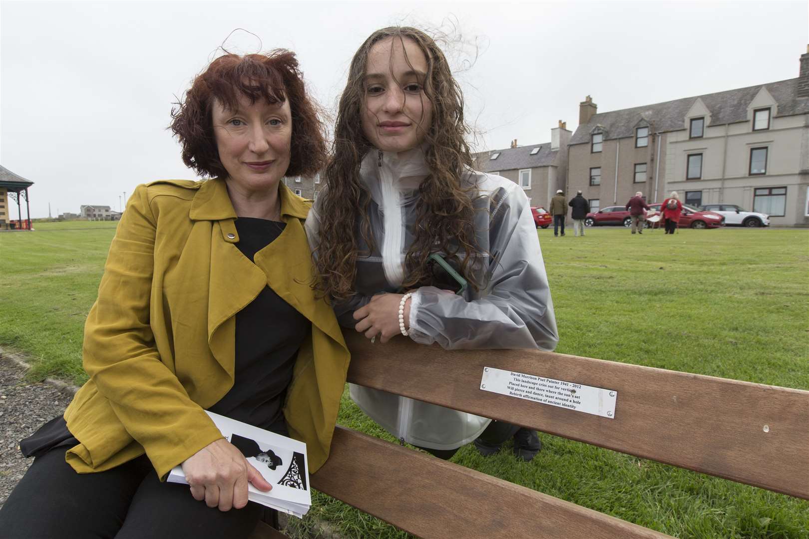 David Morrison's daughter Glenna Scacchi and granddaughter Marilena on the bench the family had erected at Wick's Braehead. Picture: Robert MacDonald / Northern Studios