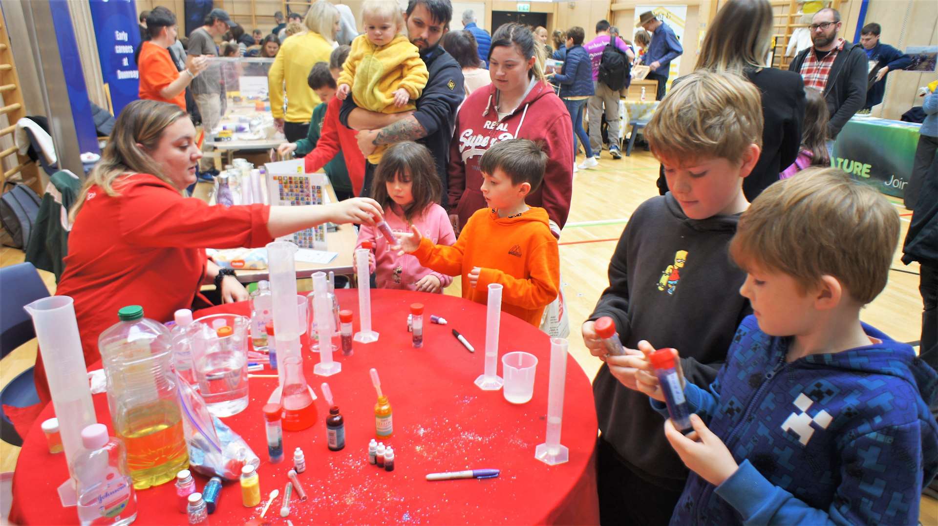Children getting involved in chemistry experiments with PhD students from Edinburgh University at the 2022 Caithness International Science Festival family fun day. Picture: DGS