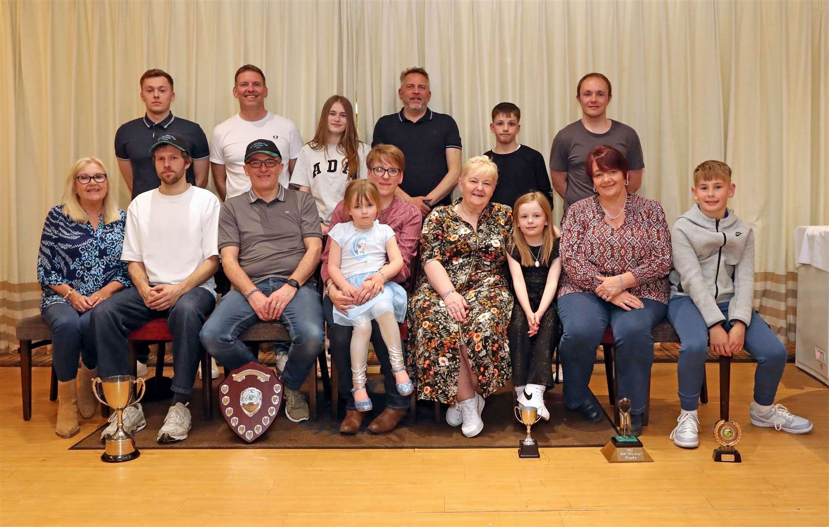Prize-winners and family members with the memorial trophies after the annual Mackays’ Golf Challenge. Back (from left): Jonathan Mackay, Aly Mackay, Marianna Green, Doug Mackay, Logan Macadie and Richard Macadie. Front: Katrina Beesley, Douglas Mackay Jnr, Alec Green, Joanna and Kirsty Ross, Susan Banks, Chloe Banks, Lyndsay Macadie and Callum McInnes. Picture: James Gunn