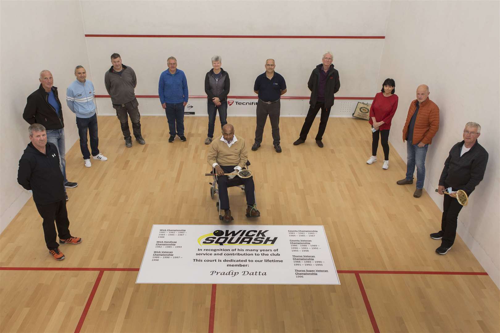 Court one at Wick Squash Club was named in Pradip Datta's honour in 2021. Picture: Robert MacDonald / Northern Studios