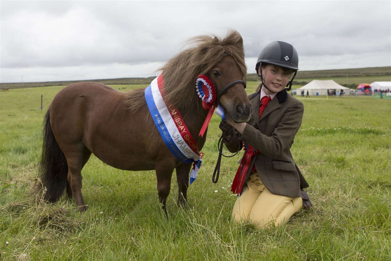 Erin Hewitson, Lhaid, Watten, at Saturday's Canisbay Show with the Shetland pony champion, Midcalder Miss Morag, an eight-year-old miniature Shetland mare owned by W & K Campbell, Mid Calder. Picture: Robert MacDonald / Northern Studios