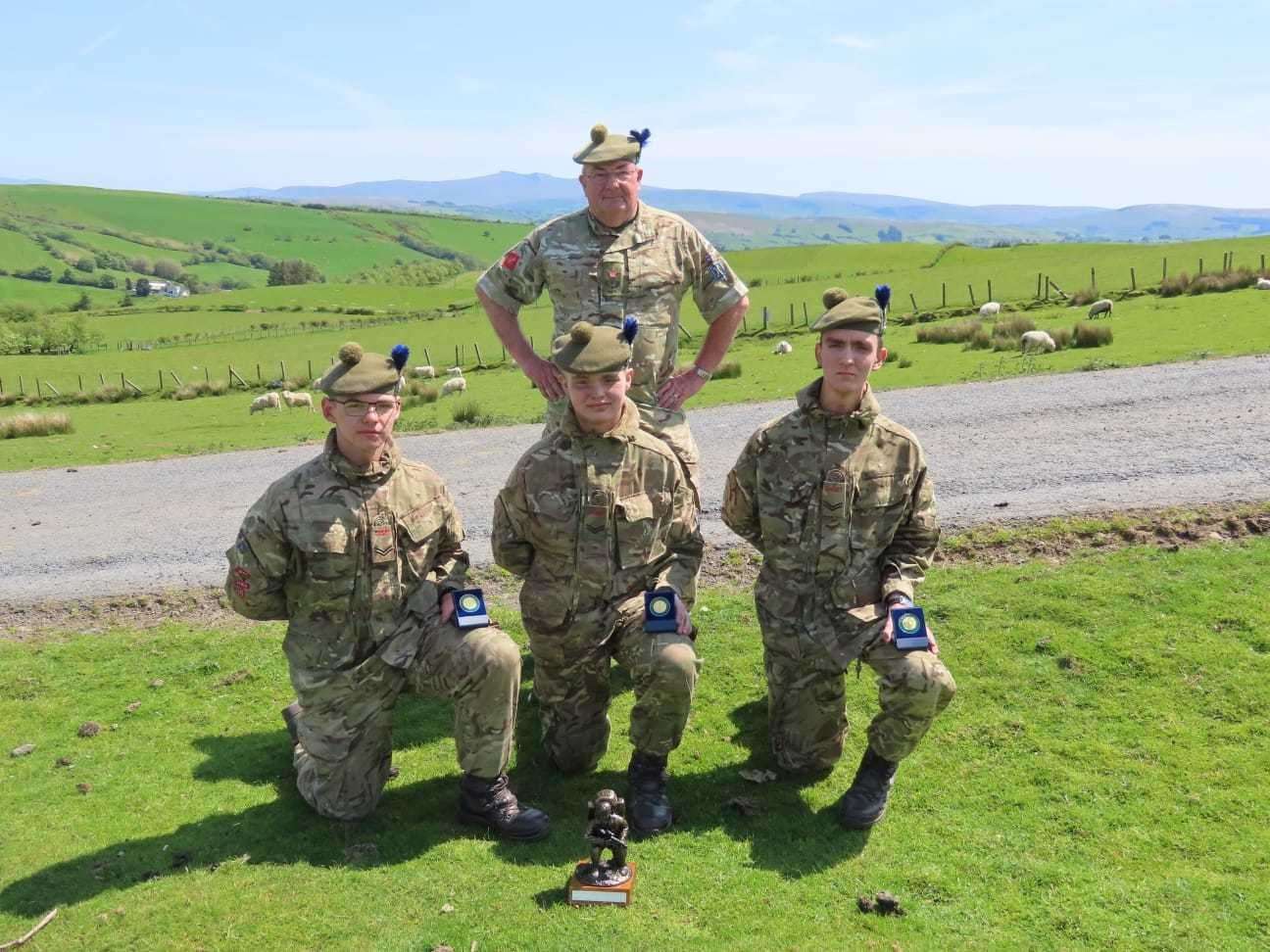 Caithness Cadets (from left) Cpl Jones, Cpl Bremner and Cpl Prideuax with Company Commander Major Neil McLean (back) who took the team to Wales.