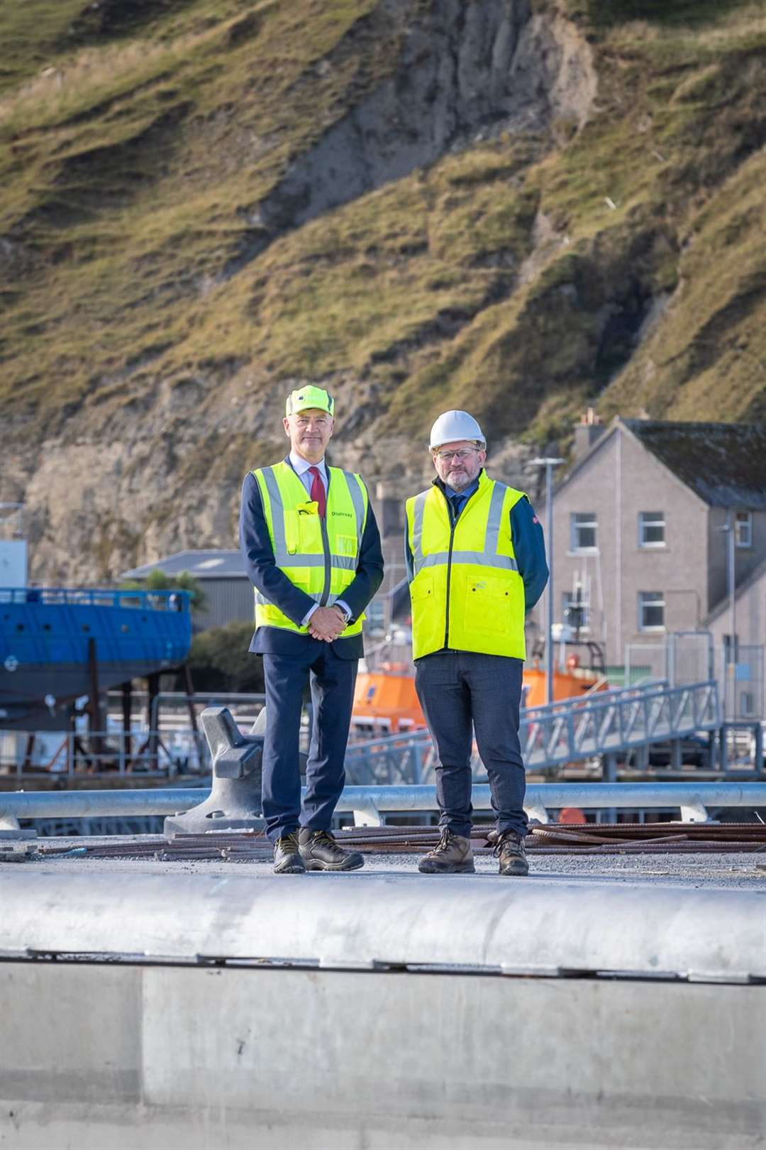 Sandy Mackie (right) with David Peattie, CEO of the Nuclear Decommissioning Authority, at Scrabster in 2021.