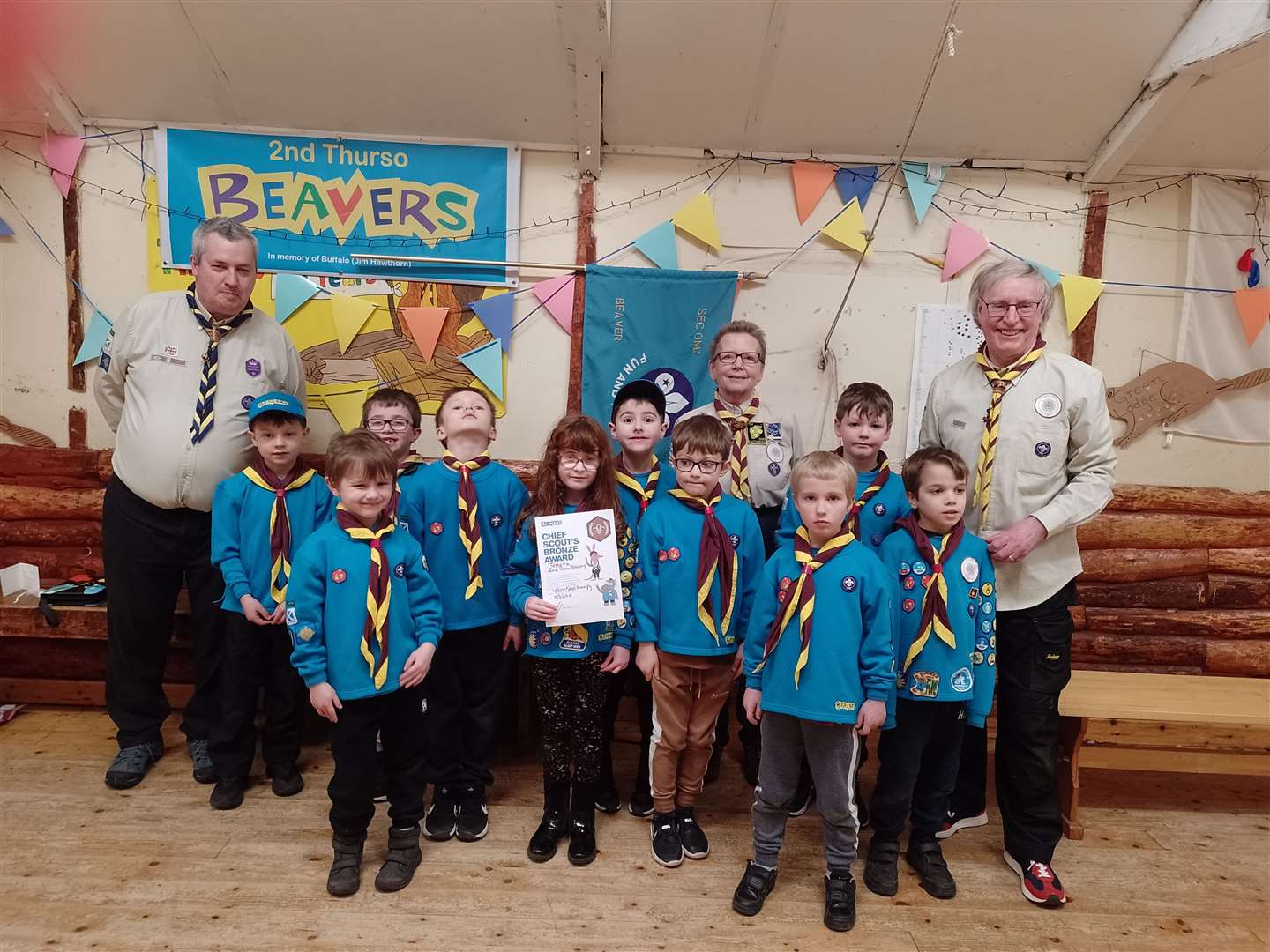 Tamara Moar (centre) received her Chief Scouts Bronze Award from Gary Stronach (left) with 2nd Thurso Beaver leaders Sandra Carson and Ian Pearson.