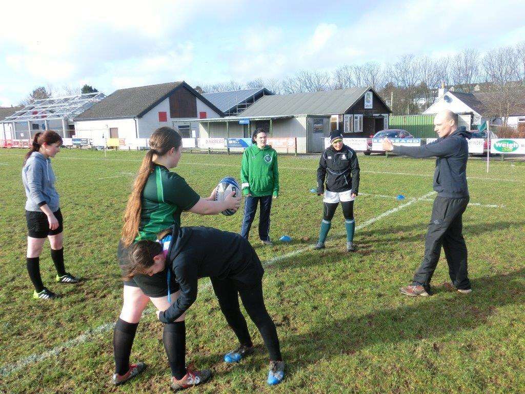 Caithness club development officer Colin Gemmill leads a training session with the women's team. Photo: Will Clark