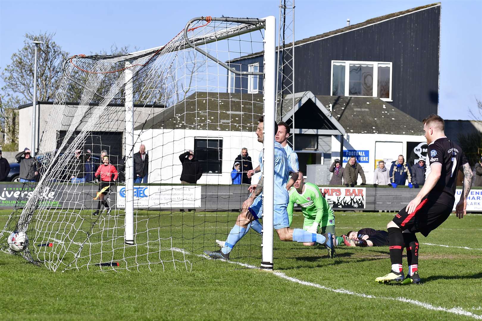Marc Macgregor watches from ground as his shot finds its way into the net to bring Academy back into the game during their 2-2 draw against Keith on Saturday. Picture: Mel Roger